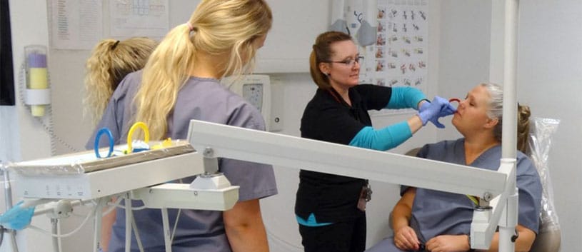 IntelliTech College Dental Assistant students practicing